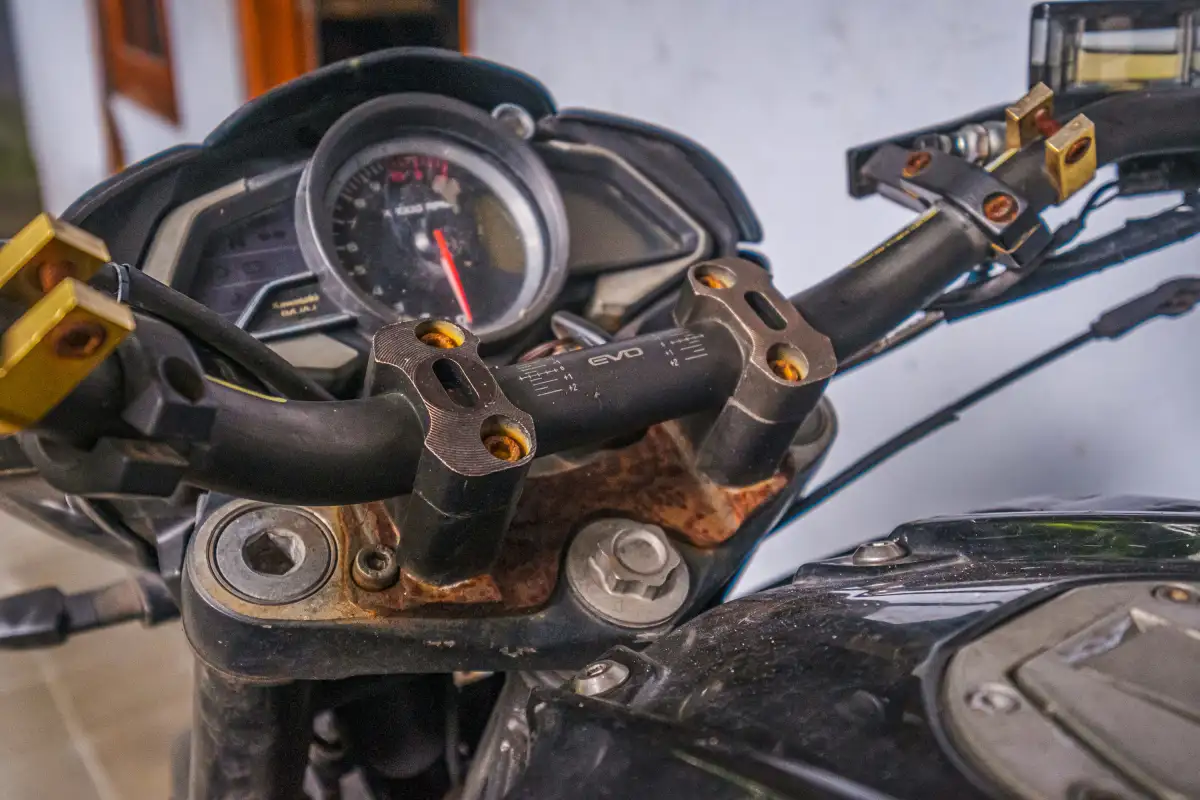 A close up of a motorcycle with a speedometer